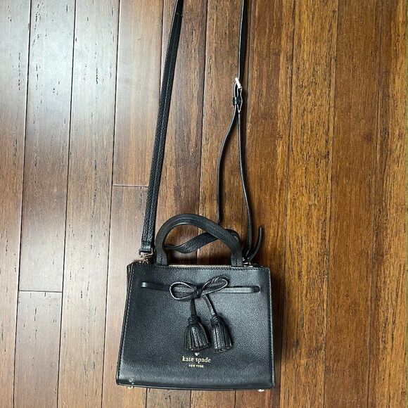 kate spade Handbags - Kate Spade Black Hayes Street Small Isobel Tasseled Bow Leather Bag  MSRP $358